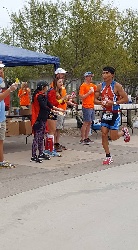 NHA running past the aid station